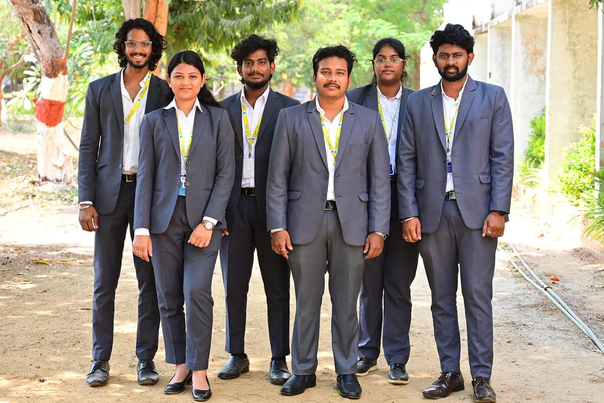 Students Standing Beside CMT Building